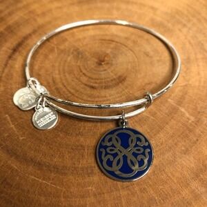 Alex and Ani sliver bangle with blue charm